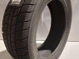 a close up of a tire on a white surface