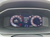 the dashboard of a car with a digital display on it