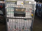 a large metal cart with a lot of items in it