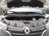 a car that has its hood open with the hood up