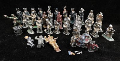 many figurines of different types and sizes on the table