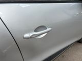 a close up of a door handle on a car