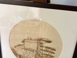une photo d'une photo représentant une maison, dans un cadre