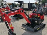 de nombreuses petites machines garées sur un parking