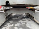 a close up view of a flatbed truck ' s rear end