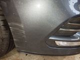 a close up of the front bumper of a car