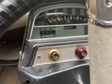 a close up of a steering wheel and dashboard of a car