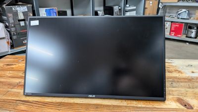 a close up of a monitor on a table in a store