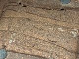a large rock with a bunch of rocks on top of it