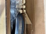 a box with a hair brush and a comb inside of it