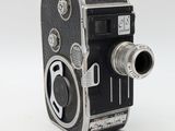 a black and white photo of an old fashioned camera