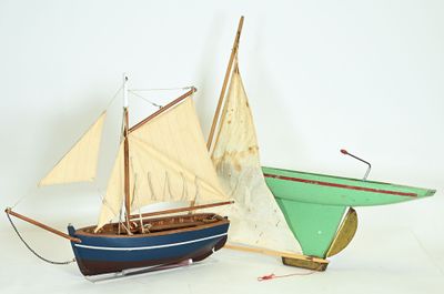two small boats that are sitting next to each other