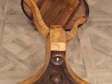 a wooden table with a wooden seat on top of it