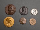 a close up of a bunch of coins on a table