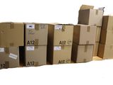 several cardboard boxes stacked on top of each other on a pallet