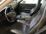a picture of the interior of a car with leather seats
