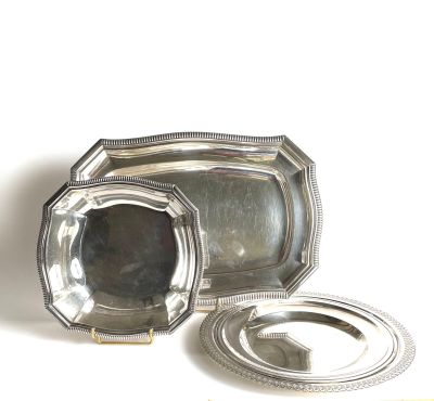 a silver tray with a silver lid and a silver tray with a silver lid