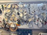 a picture of a cluttered room with a bunch of items on the wall