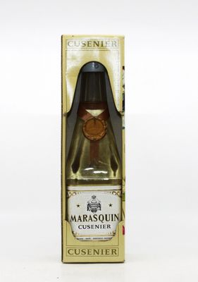 une photo d'une bouteille de Cusinner dans une boîte en carton