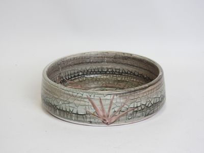 a silver ring with a star design on it