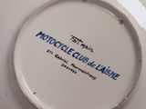 a white plate with a blue and white design on it