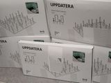 boxes of updating data stacked on top of each other on a counter