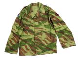 a green and brown camouflage jacket on a white background