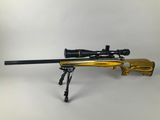 a rifle on a white background with a scope on it