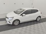 a picture of a white car parked in a garage