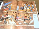 an open book with pictures of people and animals on it