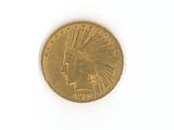 une pièce d'or sur laquelle est représentée une tête d'Indien