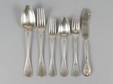 six forks and spoons are arranged in a row on a gray surface