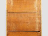 an image of a wooden dresser with a mirror on top of it