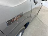 a close up of a car with a sticker on it