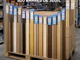 several stacks of wood planks in a store with the words 300 barrres de seul