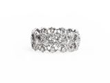 a close up of a diamond ring on a white background