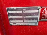 a close up of a sign on the back of a red truck