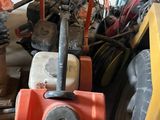a picture of a machine that is sitting in a garage