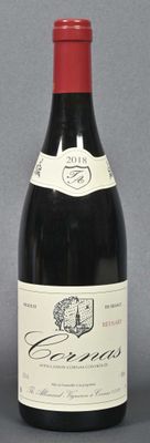 a bottle of wine that is sitting on a table