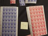 several different stamps are laid out on a sheet of paper