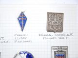 a drawing of a bunch of badges on a piece of paper