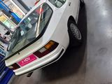 a car that is parked in a garage with other cars