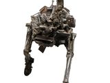statue of a robot sitting on top of a wooden base