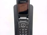 an image of a cell phone that is on a stand