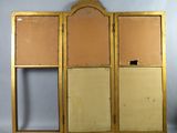 an image of an old wooden screen with a mirror on it