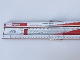 two red and white rulers sitting on top of a white surface
