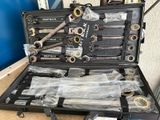 a tool case with tools in it sitting on the floor