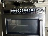 a microwave that is sitting on top of a counter
