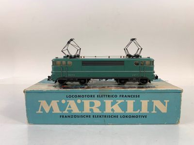 a blue box with a green train on top of it