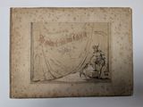 un vieux livre sur lequel figure le dessin d'un homme assis sur une chaise